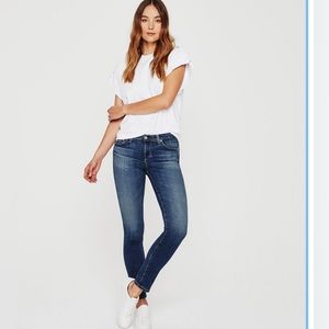 The Prima is a cigarette jean for women featuring a dark blue wash, size 25